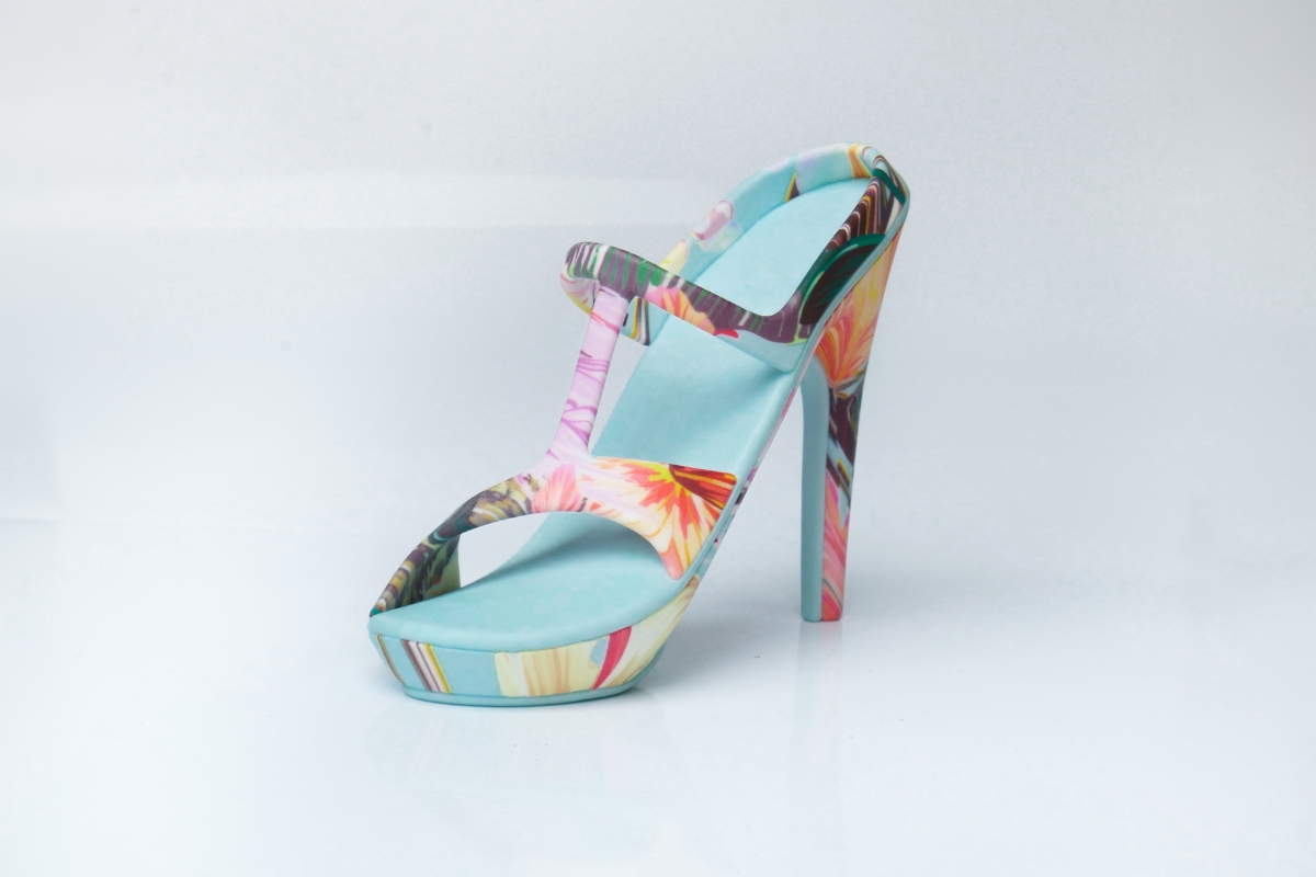 A 3D printed prototype shoe, created in pastel colours with a light blue inner and floral pattern to the outer and high heel, created on a Mimaki 3DUJ-2207 full colour 3D printer.