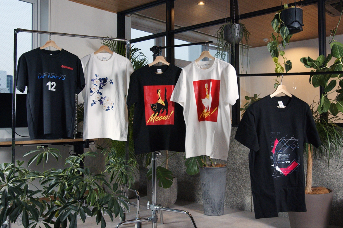 Mimaki DTF tshirts presented on a hanging display