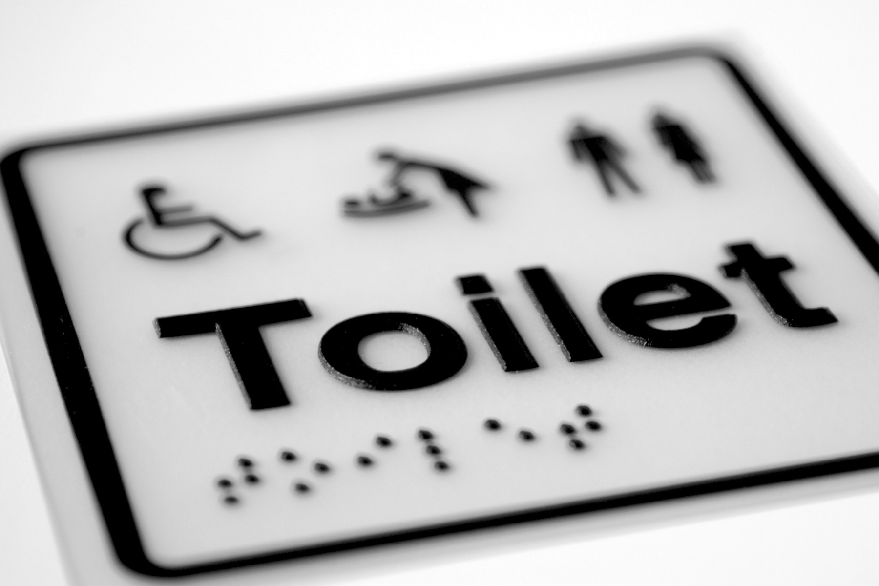 Mimaki digitally printed Braille on a toilet sign