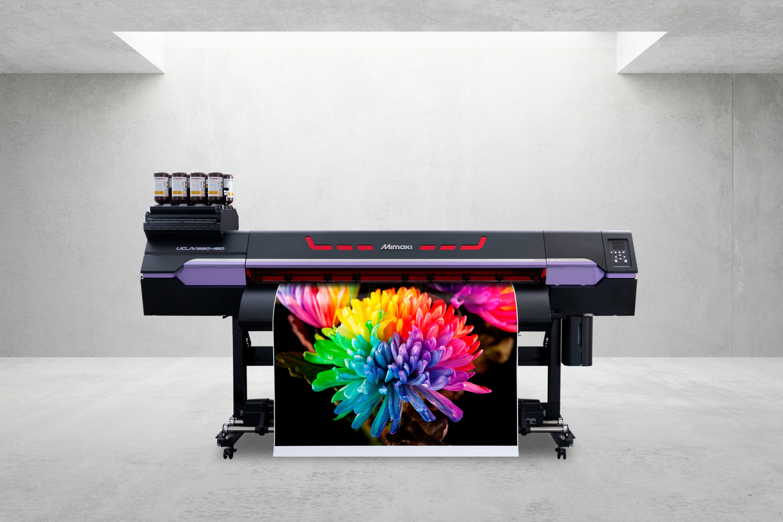 Mimaki UCJV330-160 LED UV printer/cutter with a brightly coloured print, shown against a grey background