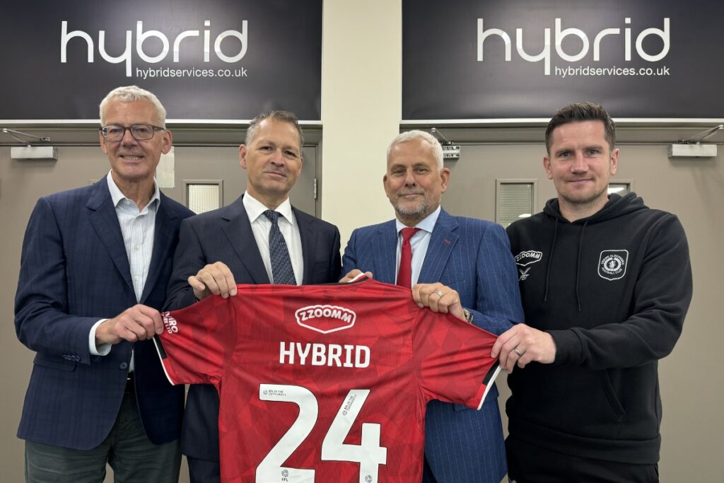 Hybrid and Crewe Alexandra FC directors along with manager Lee Bell as the club's appointment of Hybrid Services as its Official Printer Partner is announced 