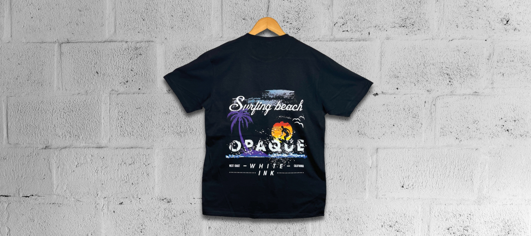 Mimaki DTF printed black t-shirt with a brightly coloured design